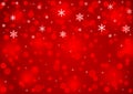 Abstract Falling Snowflakes and Sparkles in Blurred Red Background Royalty Free Stock Photo