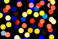 Abstract festive background with photo realistic bokeh defocused lights. Christmas atmosphere shining into the space. Royalty Free Stock Photo