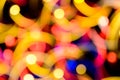 Abstract festive background with photo realistic bokeh defocused lights. Christmas atmosphere shining into the space. Royalty Free Stock Photo