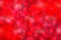 Abstract festive blurred red background texture with bokeh circles and lights for Valentine or wedding day. Card concept. Space Royalty Free Stock Photo