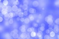 Abstract festive gradient blue white silver bokeh background texture with white bokeh lights. Beautiful backdrop with space for Royalty Free Stock Photo