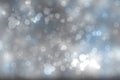 Abstract festive gradient light blue gray silver bokeh background texture with white bokeh lights. Beautiful backdrop with space Royalty Free Stock Photo