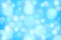 Abstract festive light blue silver bokeh background with colorful circles and stars. Beautiful texture Royalty Free Stock Photo