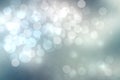 Abstract festive light blue silver bokeh background texture with colorful circles and bokeh lights. Beautiful backdrop with space Royalty Free Stock Photo