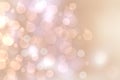 Abstract festive light brown gradient pink silver bokeh background texture with colorful circles and bokeh lights. Beautiful Royalty Free Stock Photo