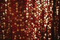 Abstract festive red and golden background of sparkle confetti circles. Holiday greeting card Royalty Free Stock Photo