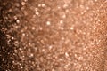 Abstract festive white to peach fuzz trend 2024 color bokeh background with shining defocus sparkles. Blurred glitters