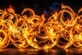 Abstract fiery swirls and loops dance against a dark background, creating an intense and captivating visual spectacle of burning Royalty Free Stock Photo