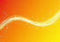 Abstract fiery wave with sparkling light trails flowing across a warm gradient background Royalty Free Stock Photo