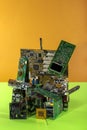 Abstract figure folded from computer circuit boards on a colored background Royalty Free Stock Photo