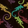 Abstract figured lizards, seamless pattern, print. Multicolored reptile on a dark background. For fabric design, textile