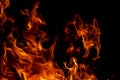 Abstract flame, fire flame texture, background. Tongues of fire on a dark background. Royalty Free Stock Photo