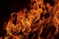 Abstract flame, fire flame texture, background. Tongues of fire on a dark background. Royalty Free Stock Photo