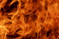 Abstract flame, fire flame texture, background. Tongues of fire on a dark background. Royalty Free Stock Photo