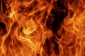 Abstract flame, fire flame texture, background. Tongues of fire on a dark background. Royalty Free Stock Photo