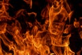 Abstract flame, fire flame texture, background. Tongues of fire on a dark background. Royalty Free Stock Photo