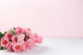 Abstract floral composition, spring background. Carnations on pink background, minimal holiday concept. Postcard for womens day or