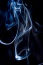 Abstract flowing Blue smoke on dark background wispy