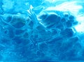 Abstract fluid art background. Blue  cyan and white colors mix together. Beautiful creative print. Abstract art hand paint. Royalty Free Stock Photo