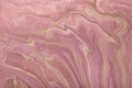 Abstract fluid art background pink and golden colors. Liquid marble. Acrylic painting with lilac gradient and splash Royalty Free Stock Photo