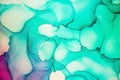 Abstract fluid art painting background in alcohol ink technique, mixture of magenta, blue and green paints. Royalty Free Stock Photo