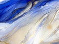 Abstract fluid blue background with gold. Liquid abstraction. Alcohol ink art resembles sea, watercolor or aquarelle.