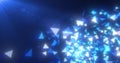 Abstract flying small blue luminous fragments bright glass triangles particles shiny energetic magical on a dark background. Royalty Free Stock Photo