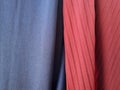 Abstract folded blue and red fabric textured background with shadow combination Royalty Free Stock Photo