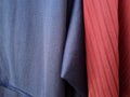 Abstract folded blue and red fabric textured background with shadow combination Royalty Free Stock Photo