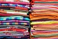 Abstract folded colorful fabrics and textile close up background