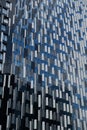 Abstract fragment of modern architecture, a wall of glass and concrete. geometric pattern