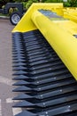 Abstract fragment of yellow and black details of large equipment for agriculture.