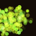 Abstract fresh lemon green yellow bokeh lens and blurred circles on dark background
