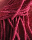 Abstract fuchsia wool strands.