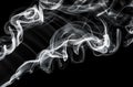 Abstract fume pattern: white smoke swirls and curves Royalty Free Stock Photo