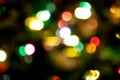 Abstract fuzzy image. Multi-colored bokeh, blurred, unfocused on a black background