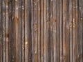 The abstract geometric background of narrow wooden aged slats