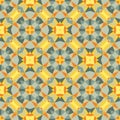 Abstract geometric background - seamless vector pattern illustration in orange, gray, green and yellow colors. Ethnic boho style. Royalty Free Stock Photo