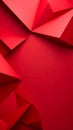 Abstract geometric background of vibrant red triangular shapes forming a textured surface with sharp edges and angular Royalty Free Stock Photo