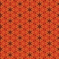 Abstract geometric bright fabric pattern Small yellow black polka dot motifs on an orange background Royalty Free Stock Photo