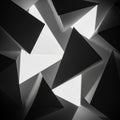 Abstract geometric composition features black and white paper triangles intersecting at various Royalty Free Stock Photo