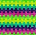 Abstract geometric harlequin pattern from rows of rhombuses in green, yellow, pink and purple