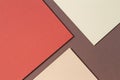 Abstract geometric paper background in earth tones. Beige, yellow, coral, brown colors background Royalty Free Stock Photo