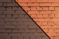 Abstract geometric pattern. Brick wall decorated with bright orange spots and stripes, shades of colors. Detail of a graffiti Royalty Free Stock Photo