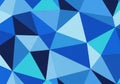 Abstract geometric pattern featuring a series of blue triangles in varying shades from light to Royalty Free Stock Photo
