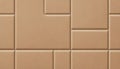 Abstract geometric pattern of varying sized tan ceramic tiles and grout lines Royalty Free Stock Photo