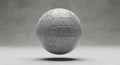 Abstract geometric patterned ball floating in gray space Royalty Free Stock Photo