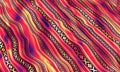 Abstract Geometric Sadu Textile Pattern with Vibrant Red, Yellow, and Black Waves Royalty Free Stock Photo