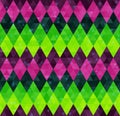 Abstract geometric seamless harlequin pattern from rows of rhombuses in green, pink and purple