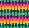 Abstract geometric seamless harlequin pattern from rows of rhombuses in green, yellow, pink and purple